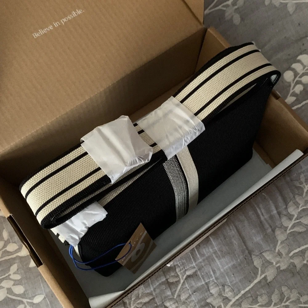 🆕 Rothy's Black Ivory Stripe Crossbody Bag Purse Shoulder Bag Sleek Pocket Zip